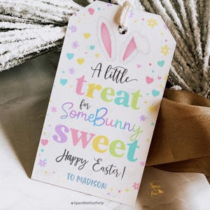 May include: A white Easter gift tag featuring bunny ears and the text "A little treat for Some Bunny Sweet Happy Easter!" in pastel colours. The tag is personalised with the name "Madison".