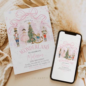 May include: A pink and white Wonderland-themed invitation and a smartphone displaying the same design. The invitation features a bow, illustrations of a nutcracker, ballerina, and Christmas tree. The phone screen mirrors the invitation's design.