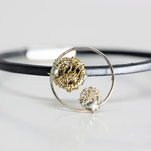 Circle disc bracelet art, Silver wire delicate artist jewelry, Black leather bangle