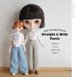 May include: Two dolls standing side by side. The smaller doll wears a white t-shirt with the text SUN SHINE and light blue wide-leg pants. The larger doll has dark hair, a white long-sleeve top, and gray straight-leg pants. Text reads PDF Sewing Pattern Straight & Wide Pants Blythe Licca Obitsu22 PNXS.
