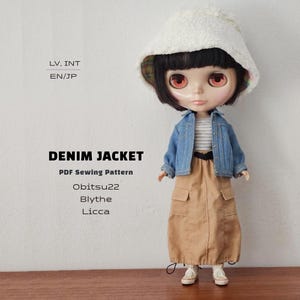 May include: A doll wearing a white fuzzy bucket hat, a blue denim jacket, a gray and white striped shirt, and a tan midi skirt. Text on the image reads: LV. INT, EN/JP, DENIM JACKET, PDF Sewing Pattern, Obitsu22, Blythe, Licca.