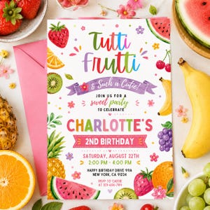 May include: A colorful invitation with the words "Tutti Frutti" and "& Such a Cutie!" announces a sweet party to celebrate Charlotte's 2nd birthday. The invitation is decorated with illustrations of various fruits, including strawberries, watermelon, and kiwi.