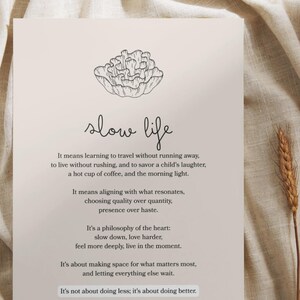 May include: A beige print with the words "slow life" in cursive, accompanied by a floral illustration. The text describes a philosophy of slowing down and appreciating life's simple pleasures. Two stalks of wheat are on the right.