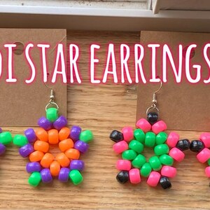 Kandi star dangle earrings