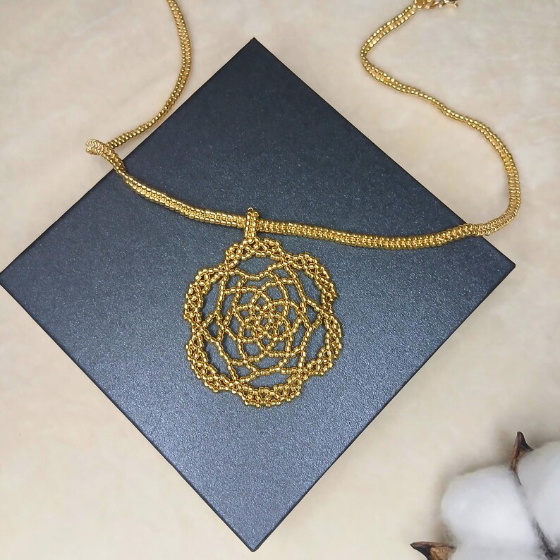 May include: A white ceramic mug with a black handle and the text "But First, Coffee" in a black, bold font. The mug is sitting on a white surface. The mug appears to be 12 ounces.