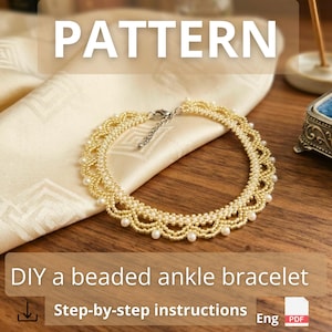 May include: A gold beaded ankle bracelet with pearl accents, displayed on a cream-colored cloth. The image includes the word "PATTERN" and text that reads "DIY a beaded ankle bracelet" and "Step-by-step instructions".