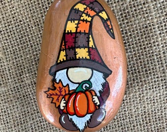 Hand-painted, Fall Gnome with pumpkin and fall leaves.