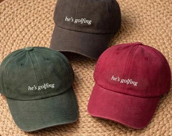 He’s Golfing Embroidered Dad Hat, Funny Golf Cap for Men, Sarcastic Golf Gift, Trendy Baseball Hat, Golf Lover Accessories