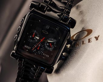 Oakley Minute Machine Inspired Chronograph – Black Steel Square Case, Bold Y2K Icon
