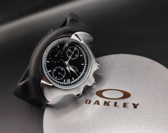 Reloj Oakley estilo Detonator - Reloj cronógrafo futurista Y2K con esfera negra y caja plateada