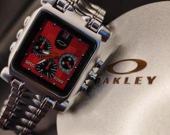 Cronógrafo Oakley Minute Machine Style: reloj cuadrado de acero con esfera roja, estilo industrial del año 2000