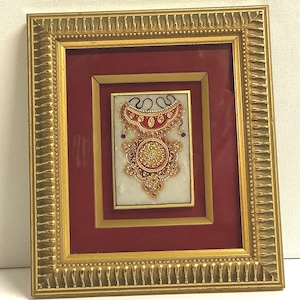 Art object of handcrafted gold leaf jewelry design on marble, embellished with pure 22K gold upon real marble base, royal city of Jaipur.
