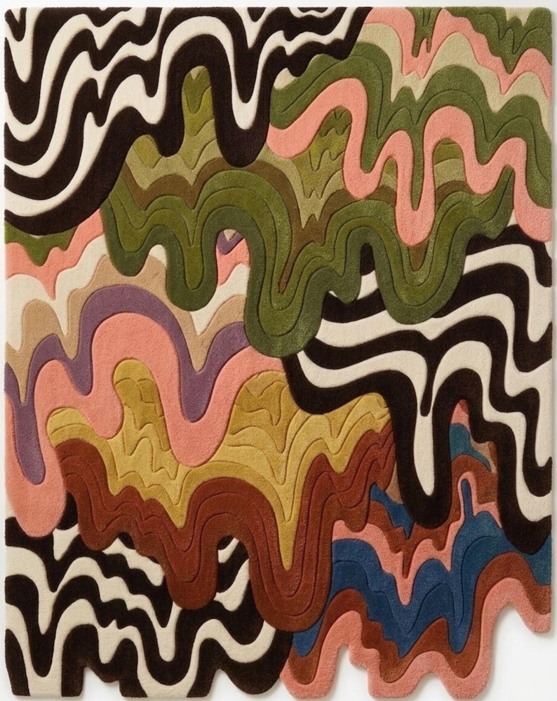 May include: A rectangular tufted rug featuring a multi-colored abstract pattern of flowing, wavy lines. The design incorporates layers of dark brown, olive green, soft pink, mustard yellow, cream, purple, and blue in a liquid-like drip effect.