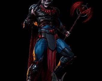 May include: A detailed figurine of a menacing character in a black and red armored suit, blue pants, and a red cape. The figure holds a red weapon and stands atop a bat-like creature. The character has pale skin and a sinister expression.