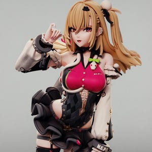 May include: A blonde anime-style figurine with long hair in a ponytail, wearing a pink and black bodice with a ruffled skirt. The character has red eyes, a black choker, and white sleeves with black cuffs labeled N.E.P.S. A small white skull accessory is attached to the chest area.