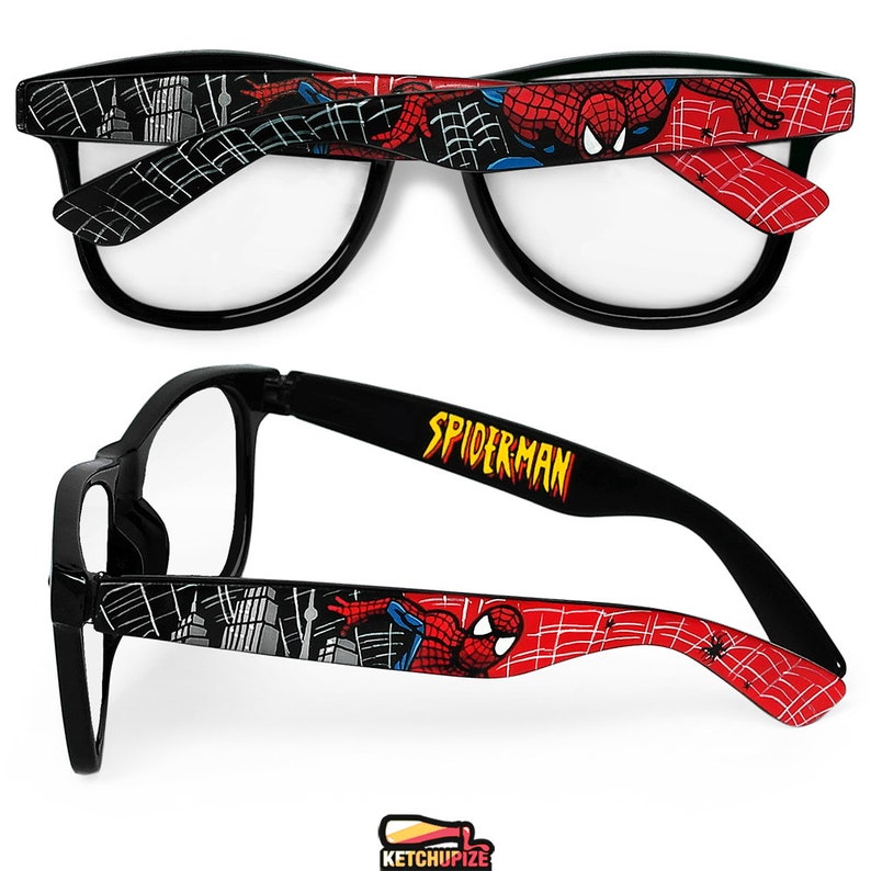 Picture of black prescription glasses, hand-painted with a Spiderman comic theme design, showing Spiderman against spider web and the city skyline, in red, blue and black colors.