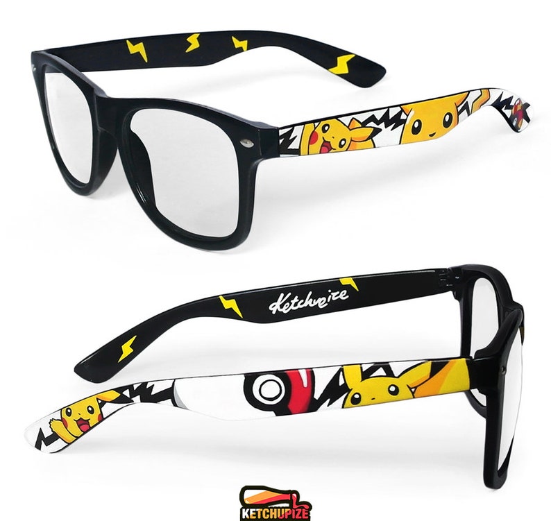 Picture of black clear lens glasses, hand-painted with a Pokemon design, including yellow Pikachu, black bolts and red and white Pokeballs on a white background, in white, black, yellow and red colors.