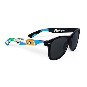 Picture of black sunglasses, hand-painted with an Adventure Time inspired design, including Finn the human and Jake the dog on a blue background with white clouds, in white, blue and yellow colors.