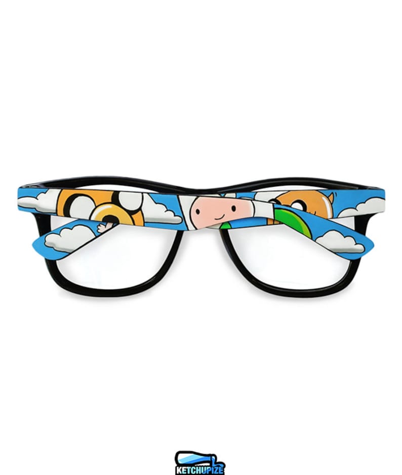 Picture of black clear lens glasses, hand-painted with an Adventure Time inspired design, including Finn the human and Jake the dog on a blue background with white clouds, in white, blue and yellow colors.