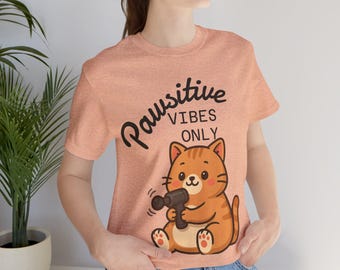 Pawsitive Vibes Cat T-Shirt, Stay Pawsitive Tee, Fun Cat Lover Gift, Friendly Graphic Tee, Everyday Comfort Wear, Casual Cat Apparel