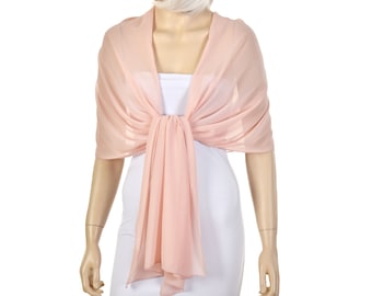 May include: A pale pink chiffon shawl with a knotted front.