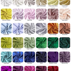 May include: A colour chart of 25 different satin fabric swatches. The swatches are arranged in five rows of five, with each swatch labelled with its colour name. The colours include off-white, ivory, bone, light champagne, crepe pale yellow, crepe gold, lemon yellow, dusty lilacs, pale pink, blush pink, pinkish mauve, pale peach, dusty blue, sky blue, silver, crepe silver, burnt orange, terracotta, chartreuse pear, grass green, sage green, kelly green, emerald green, pine green, cyan blue, royal blue, dark blue, navy, reddish purple, mauve grey, hot magenta, eggplant, fuchsia, bordeaux, and red.