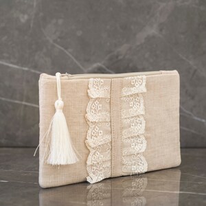 Hand-Embroidered Linen Clutch with Brass Frame