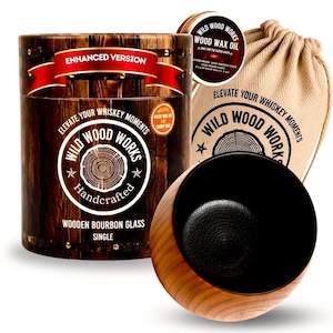 May include: A wooden bourbon glass set with a wooden glass, a black coaster, a canvas bag, and a tin of wood wax oil. The glass is in a wooden barrel-shaped container with the text "Wild Wood Works". The set is designed to elevate whiskey moments.