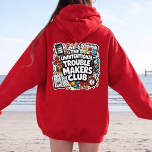The Unintentional Troublemakers Club Hoodie | Retro Doodle Graphic