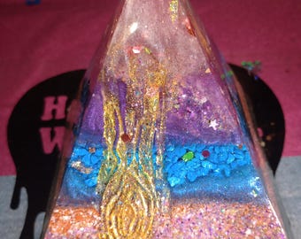 Galaxy themed pyramid with a heart shaped secret compartment at the bottom