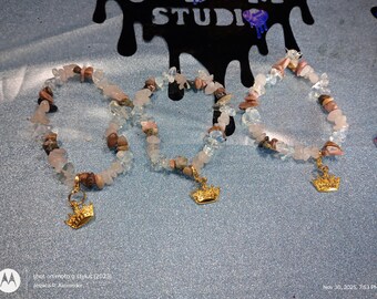 Rose quartz, Rhondyte, and opalite stretchy bracelet with gold carm