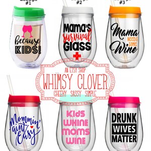 May include: A collection of six clear, double-walled stemless wine glasses with colorful lids and straws. Each glass features a different humorous phrase in black or white text, such as "Because KIDS!" and "Mama's Survival Glass."