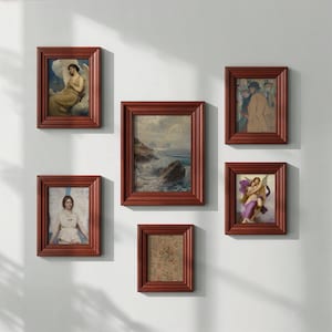 May include: A collection of six framed art prints with reddish-brown wooden frames. The artwork includes classical paintings of angels, landscapes, and figures. The frames are arranged on a white wall, creating a gallery-like display.