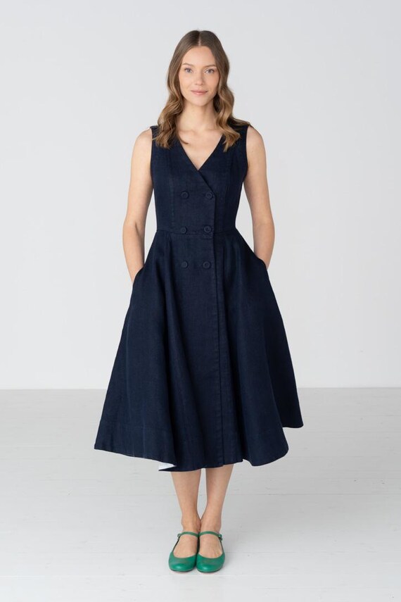 navy blue dress with green shoes Sophia Bush showcases fab figure in blue dress and green heels