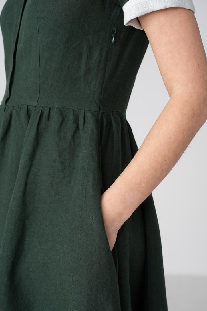 green peter pan dress Pepa London Handsmocked Peter Pan Collar Short Sleeve Dress in Green (12mths-10yrs) Luxury Childrenswear main image 1