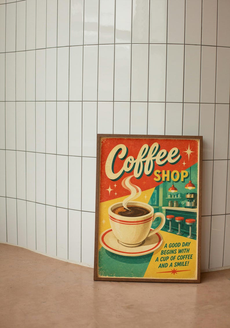 May include: A rectangular framed wall art print featuring a retro illustration of a coffee cup on a saucer. The text reads Coffee SHOP and A GOOD DAY BEGINS WITH A CUP OF COFFEE AND A SMILE! The background depicts a diner counter with red stools.