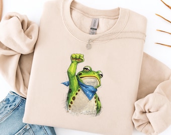 Camiseta "Rana de la Resistencia", "Portland Libre", "Rana de la Libertad", "Debido Proceso", "Anti-MAGA", "Activista", "Política", "Femista por la Igualdad"