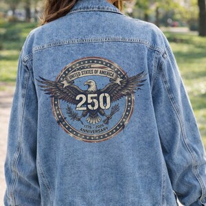 Unisex Denim Jacket Men Women Casual Fit Medium Wash Jean Outerwear Button Front Design Patriotic USA Eagle Back Print 250th Anniversary Birthday Celebration Apparel American Style Fashion Vintage Distressed Grunge Aesthetic Everyday Wear
