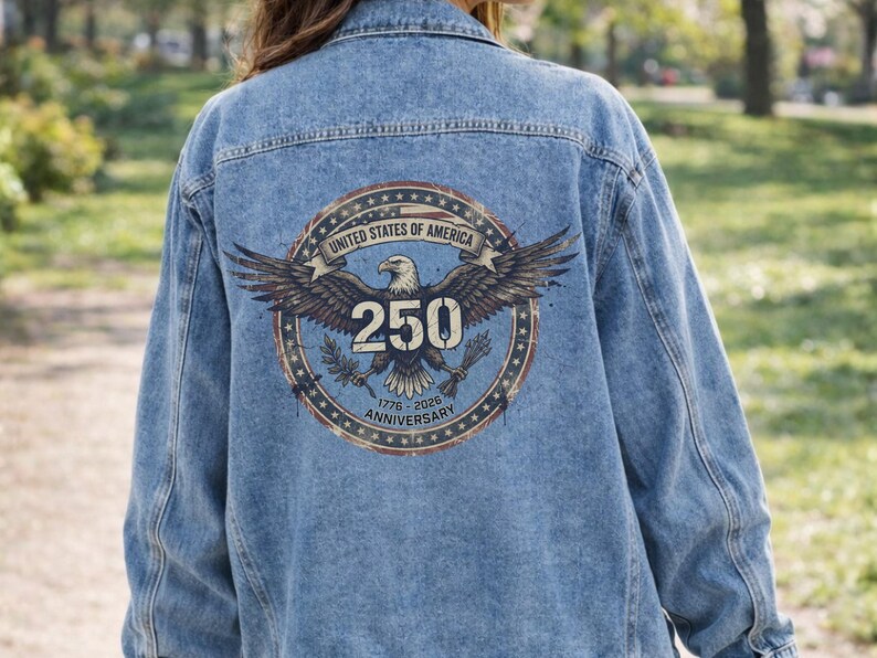 Unisex Denim Jacket Men Women Casual Fit Medium Wash Jean Outerwear Button Front Design Patriotic USA Eagle Back Print 250th Anniversary Birthday Celebration Apparel American Style Fashion Vintage Distressed Grunge Aesthetic Everyday Wear