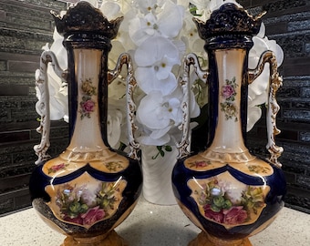 Pair of Vintage Blue & Gold Floral Ceramic Vases – Ornate Handles – One with Small Rim Crack