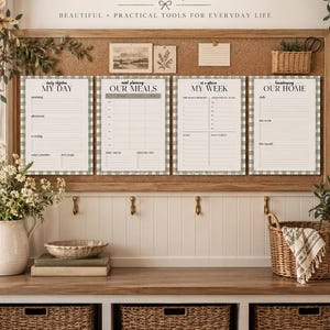May include: A command centre display featuring four printed planners with a green gingham border. The planners are titled MY DAY, OUR MEALS, MY WEEK, and OUR HOME. The text CREATE A COMMAND CENTRE that works for your home is displayed above.