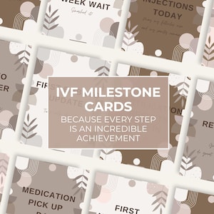 May include: A collection of IVF milestone cards in shades of brown, beige, and pink. The cards feature text such as "Embryo Transfer Day" and "Egg Retrieval Day", with decorative leaf and abstract shapes. The central card reads "IVF Milestone Cards".