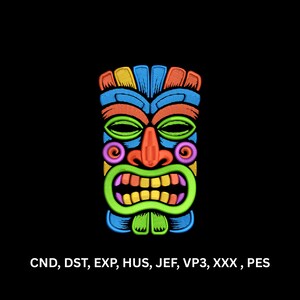 May include: A colorful machine embroidery design of a tiki mask featuring blue, orange, yellow, green, and purple thread work. The mask has a prominent nose, wide eyes, and a toothy grin. Below the mask is the text CND, DST, EXP, HUS, JEF, VP3, XXX, PES.