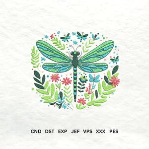 May include: Embroidered design of a dragonfly with green and blue wings, surrounded by flowers and leaves in a circular pattern. The design includes small butterflies and the text "CND DST EXP JEF VPS XXX PES".