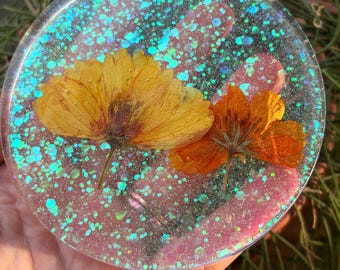 Glitterblommor i harts, par underlägg