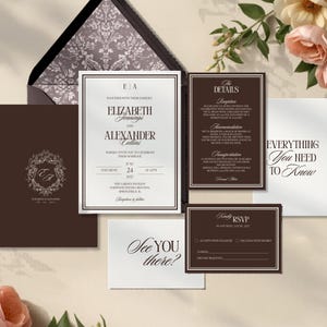 May include: A collection of wedding stationery in shades of brown and white. The invitation suite includes an invitation, details card, RSVP card, and a card that says "Everything You Need To Know". The invitation features the names Elizabeth Jennings and Alexander Collins.