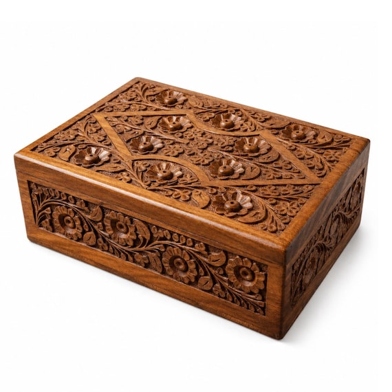 Hand-carved rosewood box with a hidden puzzle-lock mechanism — equal parts functional keepsake and brain teaser.
