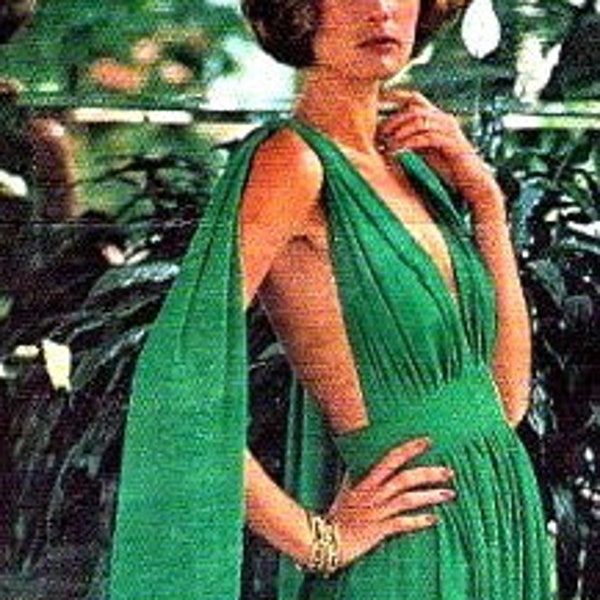 1970s Goddess gown Emanuel Ungaro design. Full Gathered Skirt. Halter neckline and shoulder pendand optional.