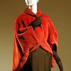 1954-55 Charles James short coat or jacket, inspired by the dolmens of the late 19th century, which were capes with sleeves.