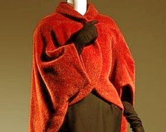 1954-55 Charles James short coat or jacket, inspired by the dolmens of the late 19th century, which were capes with sleeves.